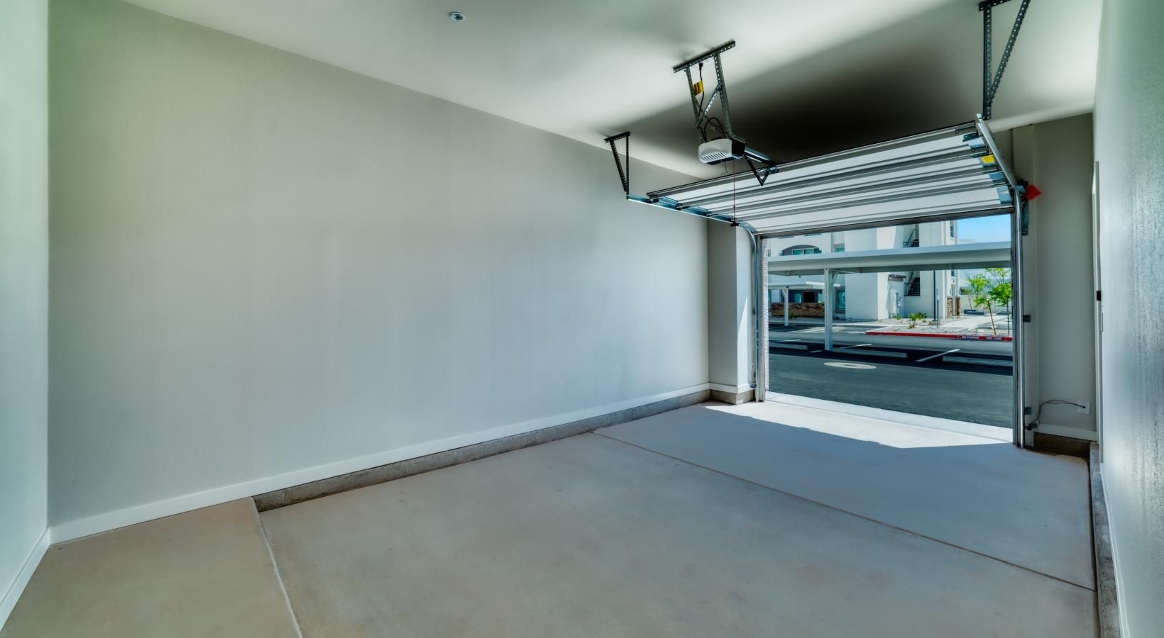 The essence of exceptional living a hallway with a light on the ceiling