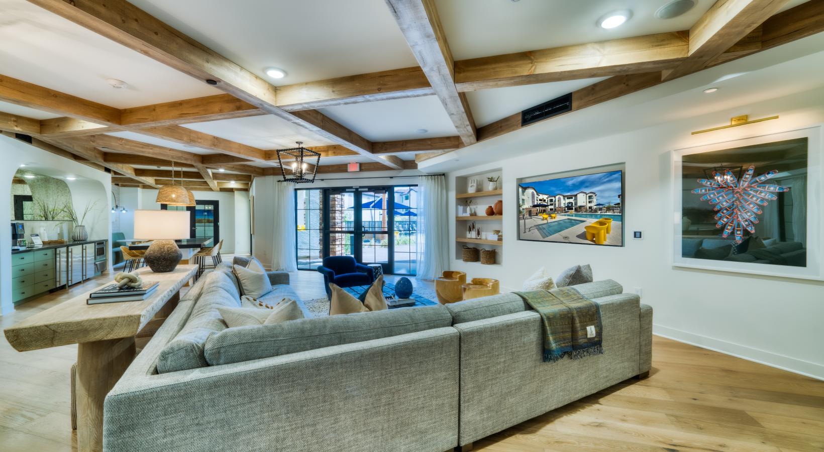 Access to resident-only features a living room with a couch and a table