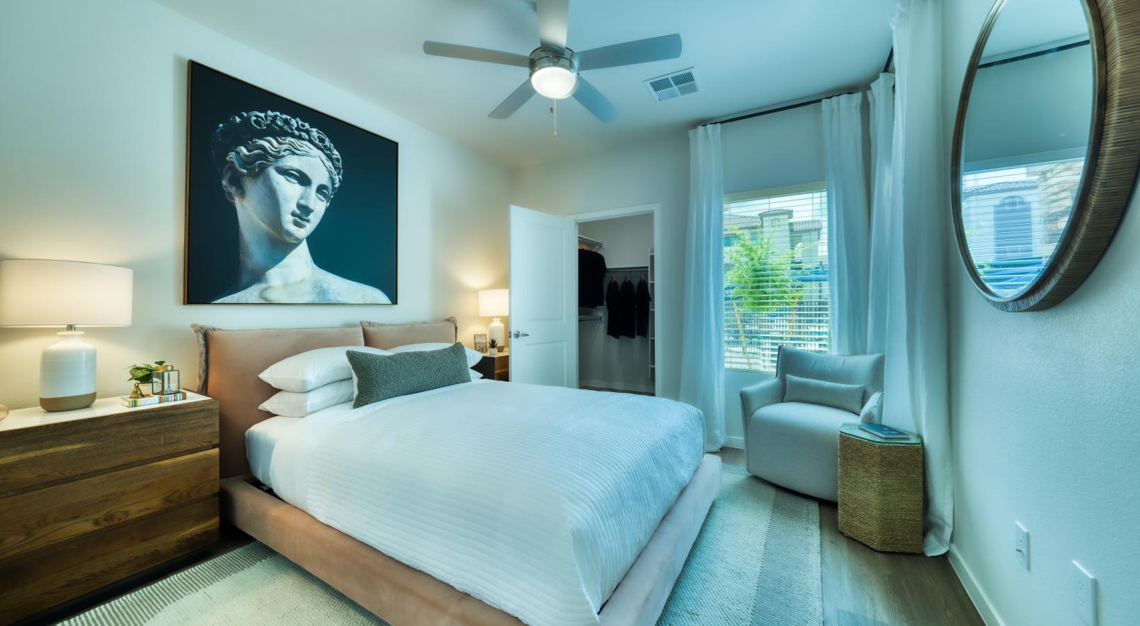 Beautiful bedrooms to fit every need a bedroom with a large mirror