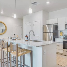 Sleek stainless steel appliances and contemporary granite countertops, our premium kitchen is perfectly tailored to your culinary needs here. ✨ Time to spice up your evening meal inside your new home at The Riley.  Schedule a tour to see more of what life has to offer you. Link in bio. Instagram post from @therileyapts on December 22, 2024 00:00:00am