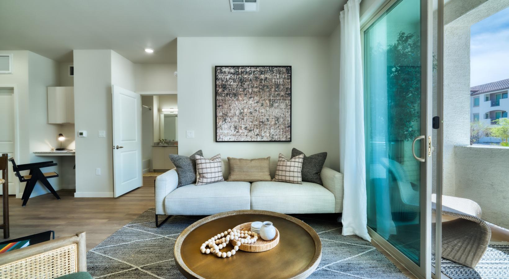 Relax and unwind in stylish living spaces a living room with a couch and a coffee table