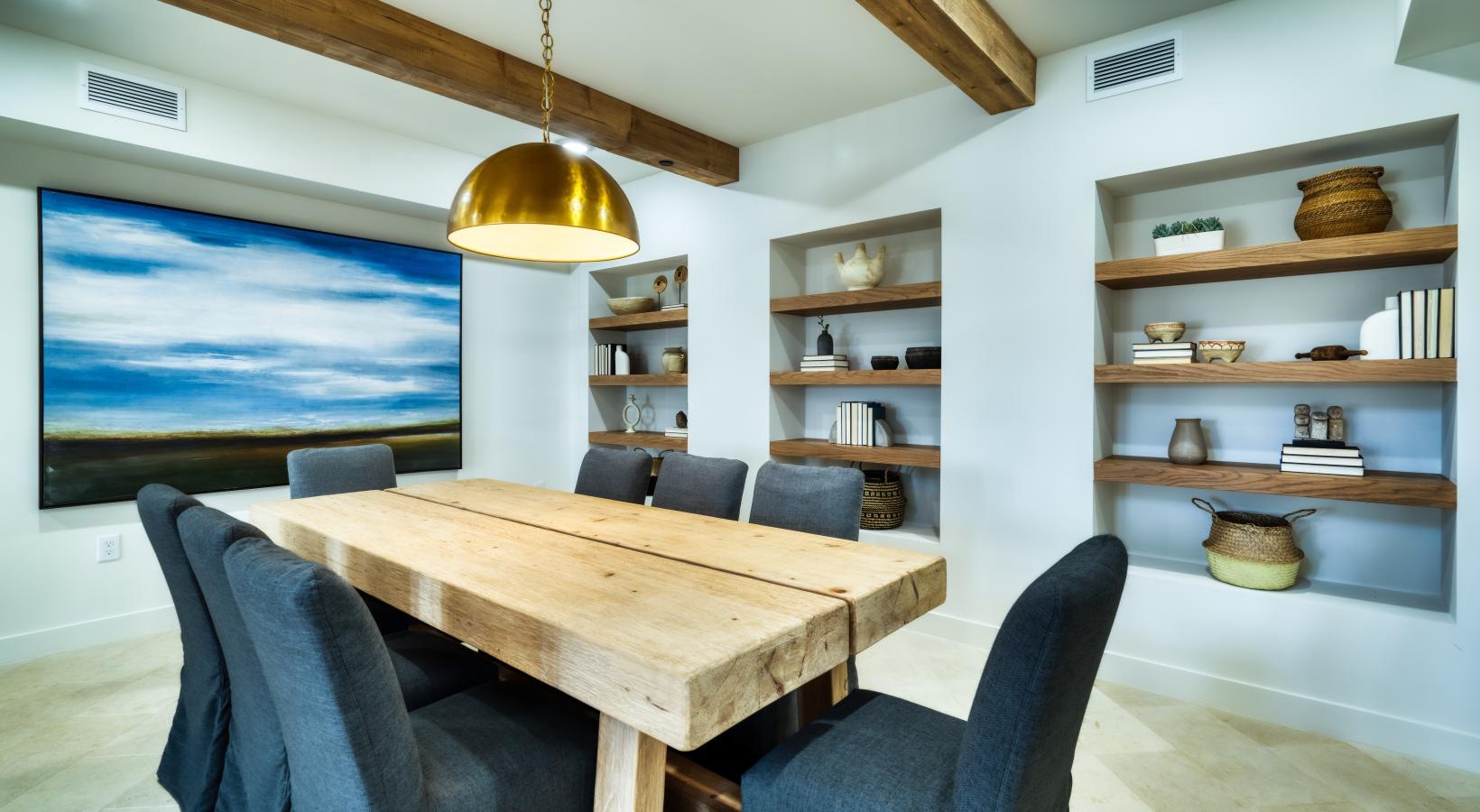 Enjoy our resident-only features a room with a table and chairs