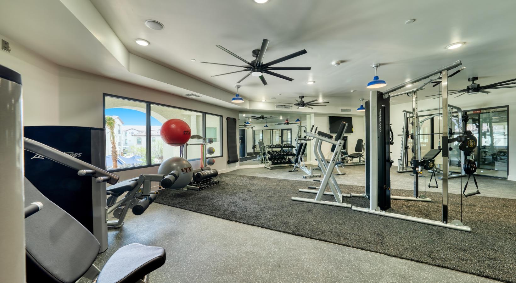 Everything within reach a room with exercise equipment and a balloon